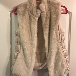 White fur vest
